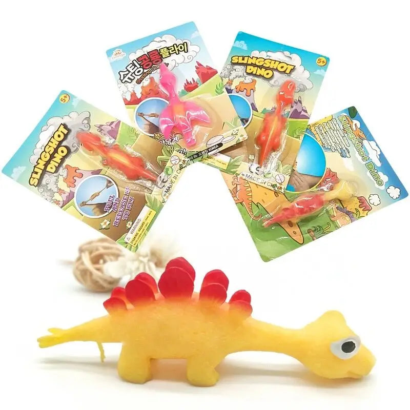 Dinosaur finger slingshot leksak