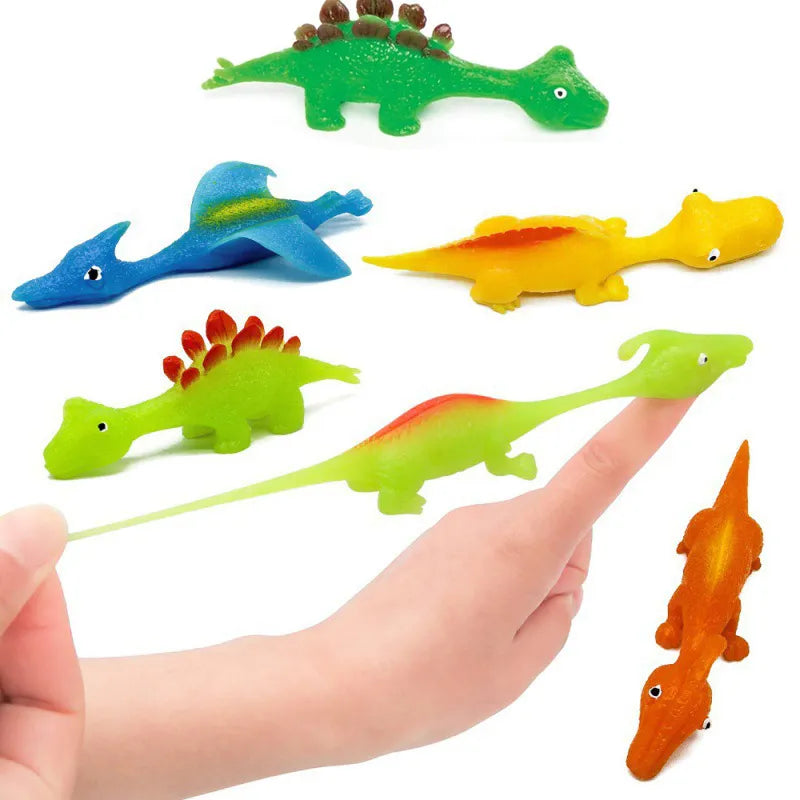 Dinosaur finger slingshot leksak